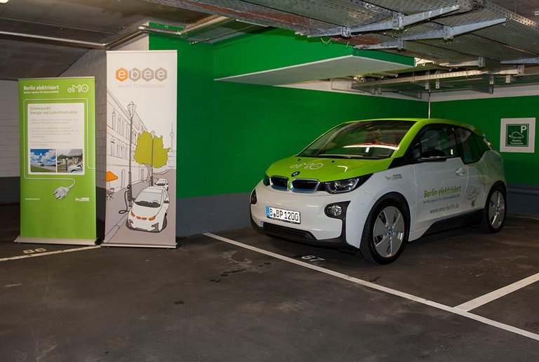 Sleep & Charge, EV charging station and electric car at centrovital Berlin